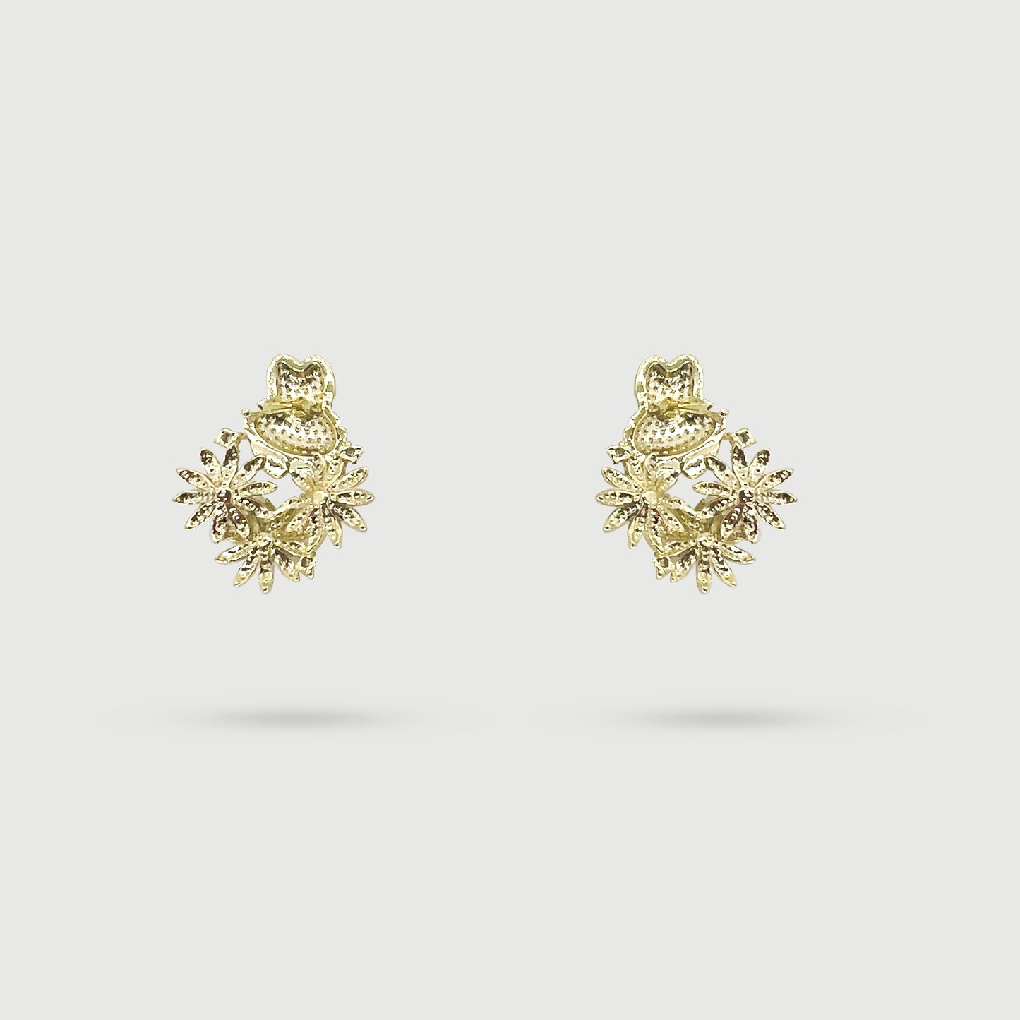 White rabbit earrings with small daisy