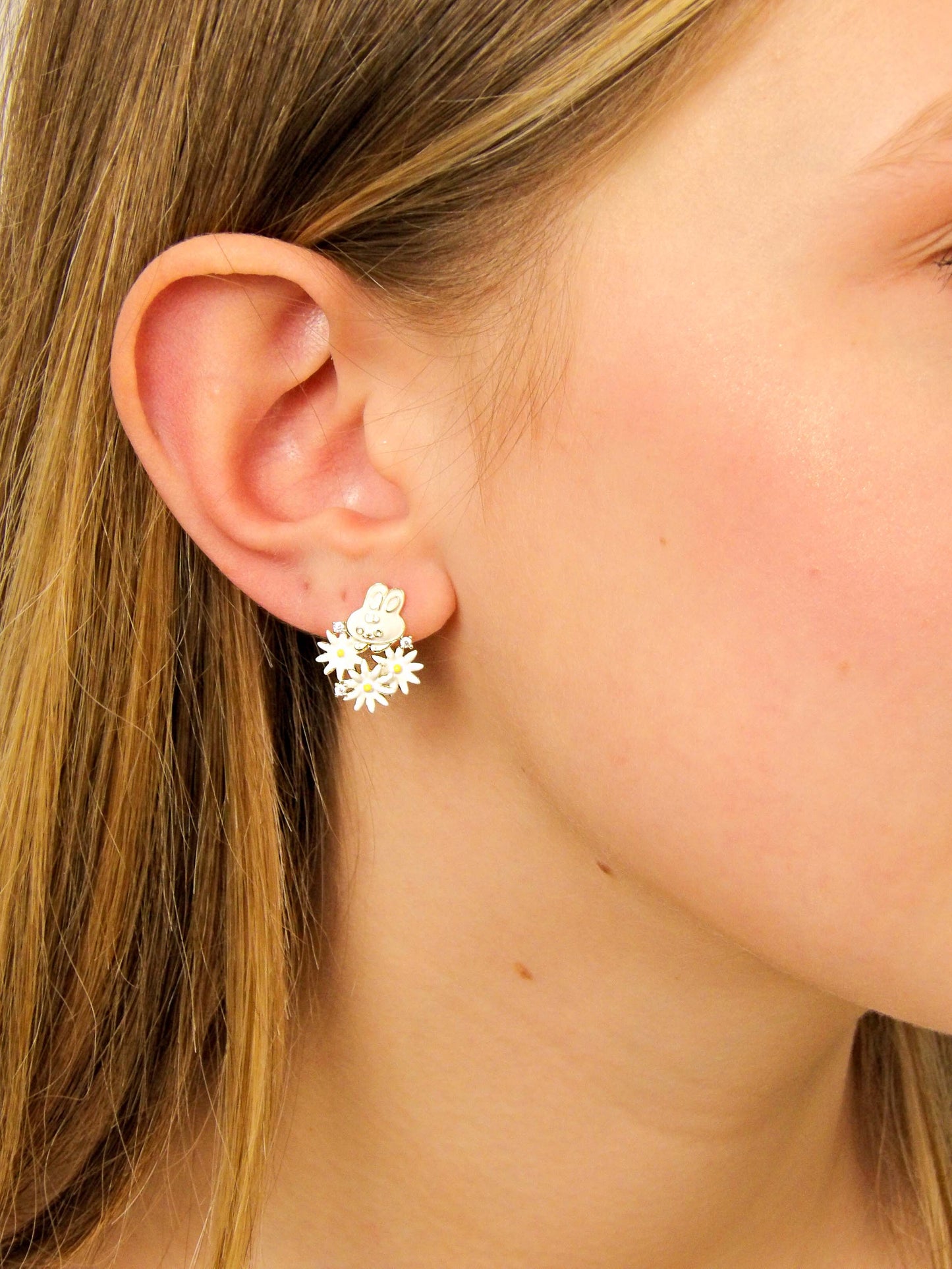 White rabbit earrings with small daisy