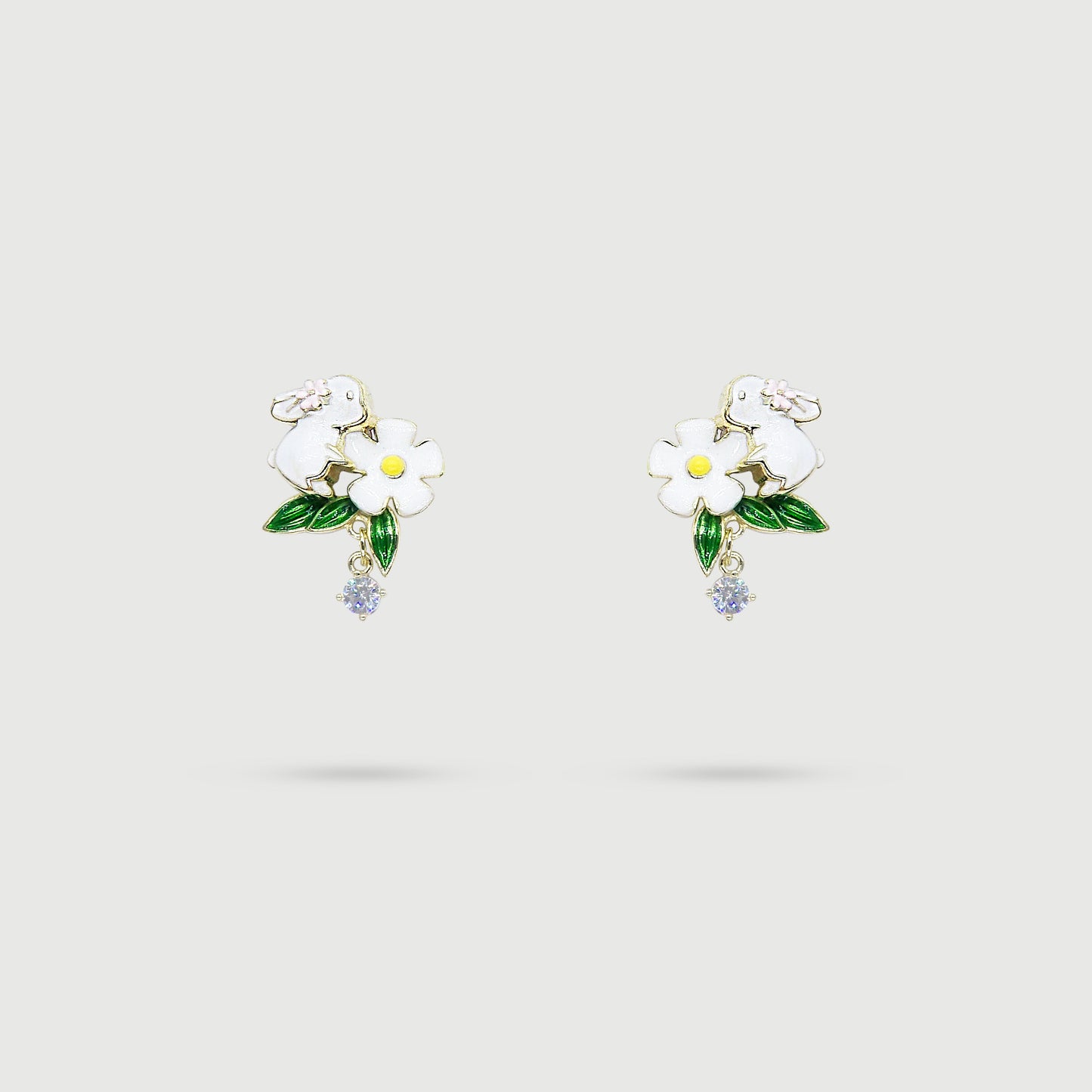 Boucles d'oreilles lapin avec fleur blanche