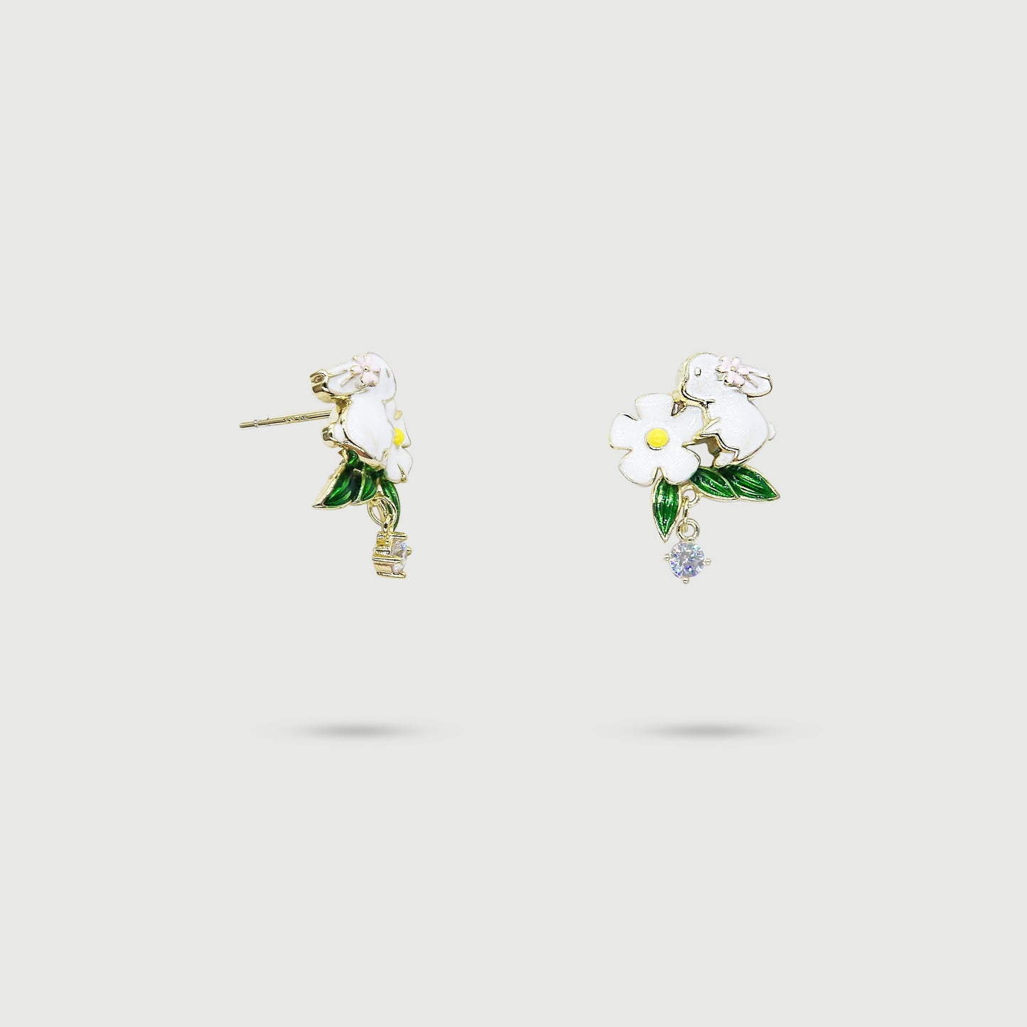 Boucles d'oreilles lapin avec fleur blanche