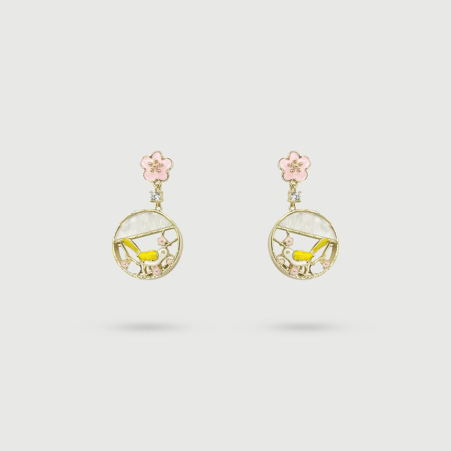 Yellow bird with cherry blossom