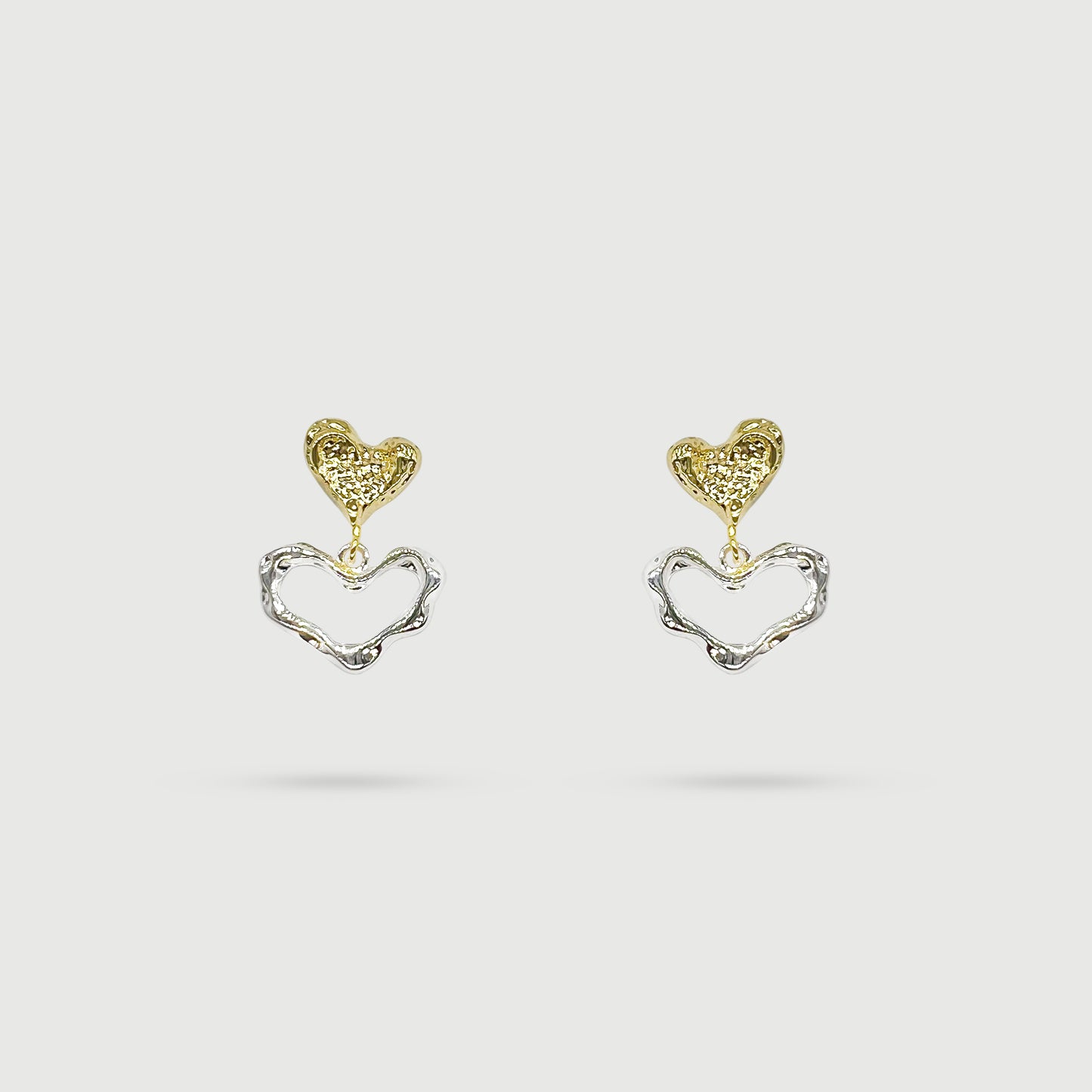 Gold and silver heart earrings