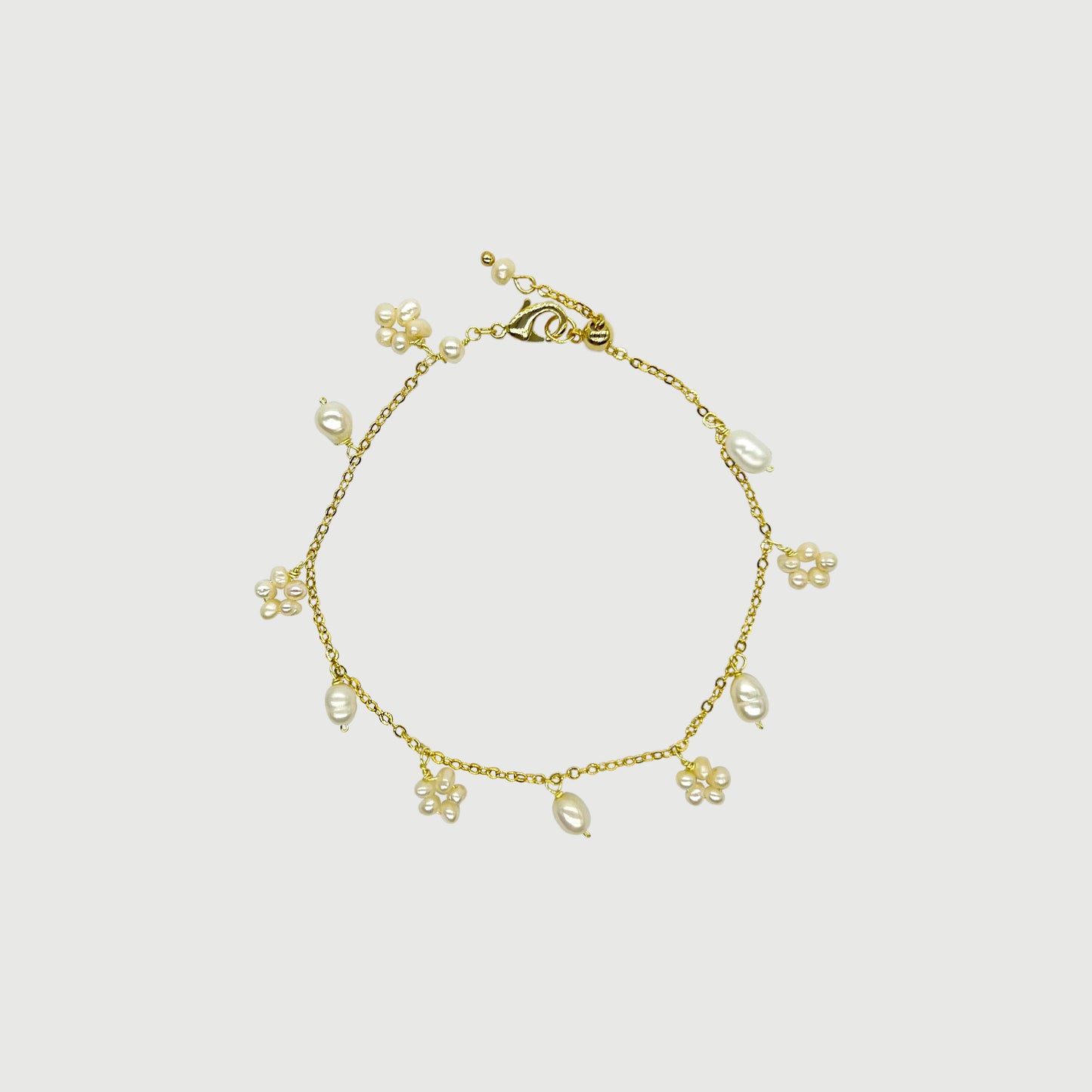 Bracelet fleurs de perles et perles rondes