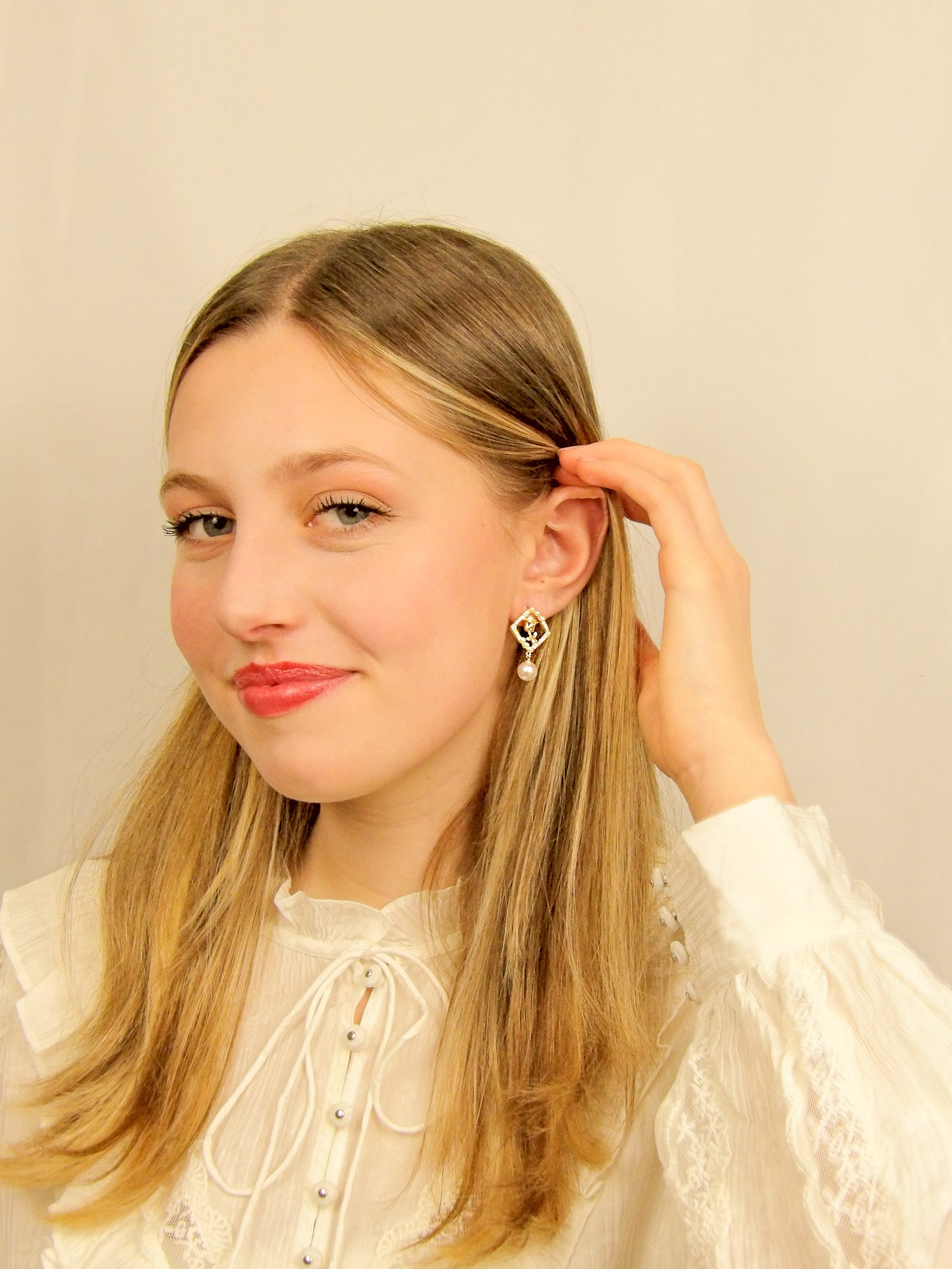 Boucles d'oreilles dorées et rose avec perle
