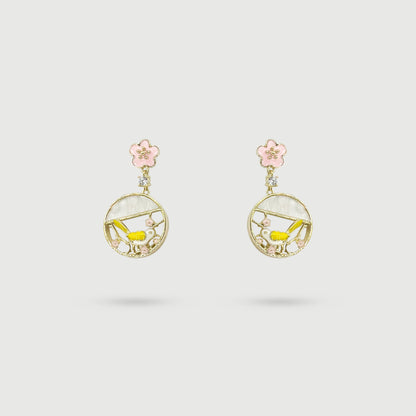 Yellow bird with cherry blossom