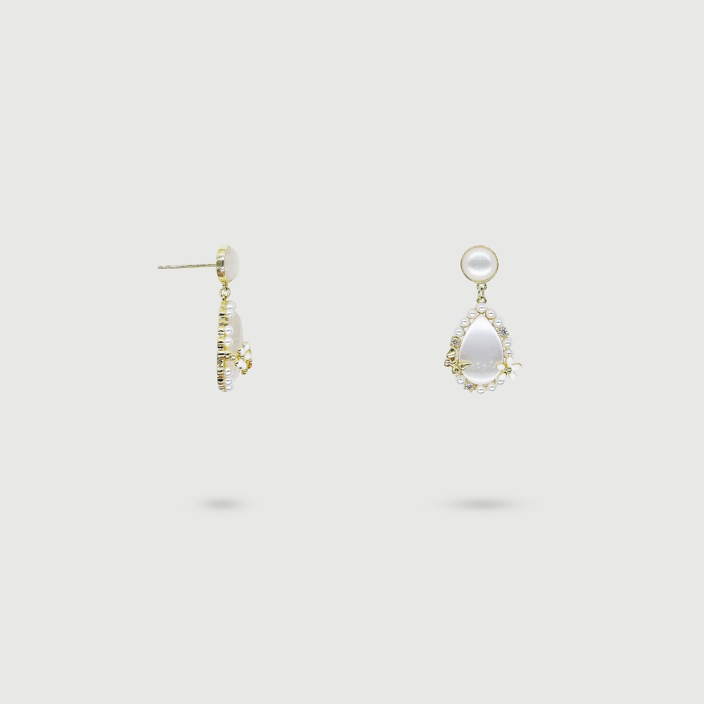 Boucles d'oreilles papillon et fleur avec perle et pierres blanches