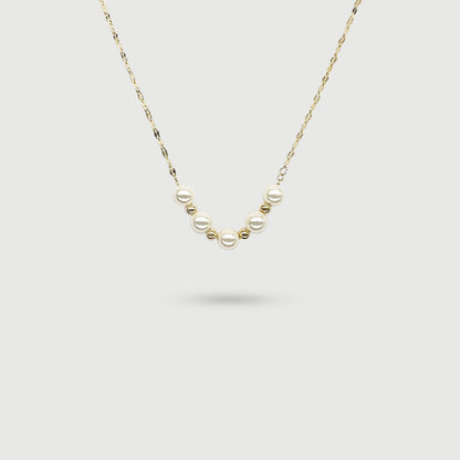 Collier vintage en or avec cinq perles