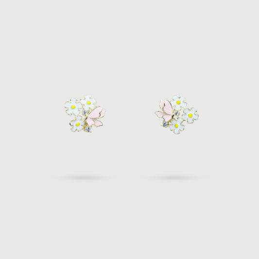 Boucles d'oreilles fleurs blanches avec papillon