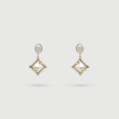 Boucles d'oreilles étoile avec fleur rose