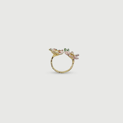 Bague ajustable deux fleurs rose pâle avec pierre en verre rose foncé